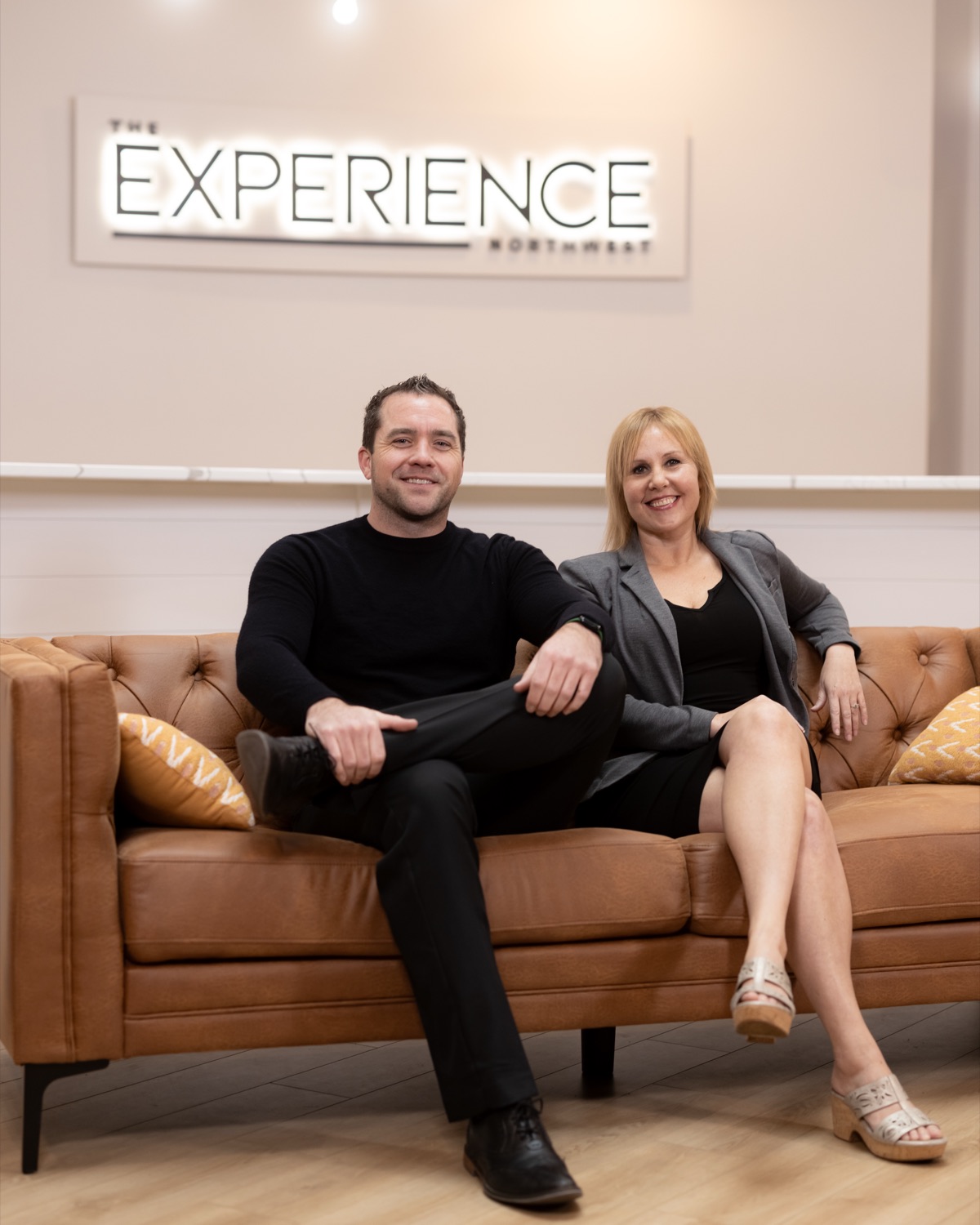 Nick Beveridge and Jo Turner, co-team leaders of REI Realty at The Experience Northwest