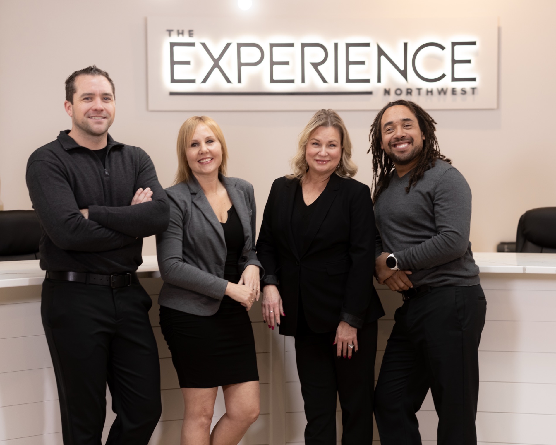 The REI Realty team at The Experience Northwest office